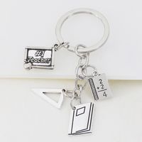 Cute Mini Learning Tools Pendant Bachelor Hat Ruler Schoolbag Book Laptop Keychain main image 1