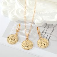 Fashion Golden Round Coin Embossed Angel Earring Necklace Set main image 1
