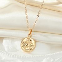 Fashion Golden Round Coin Embossed Angel Earring Necklace Set main image 3