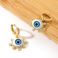Fashion Blue Eye-shaped Inlaid Zircon Copper Earrings Wholesale main image 1