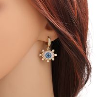 Fashion Blue Eye-shaped Inlaid Zircon Copper Earrings Wholesale main image 4