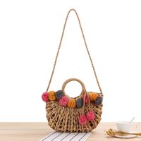 New Cute Color Hair Ball Hollow Hand-carried Straw Woven Bag 32*28*7cm main image 1