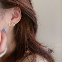 Simple Metal Inlaid Rhinestone M-shaped Geometric Stud Earrings Wholesale main image 5