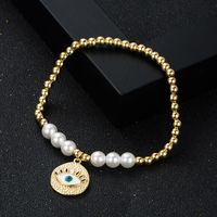 Fashion Copper Gold-plated Oil Devil's Eye Beads Pearl Elastic Bracelet sku image 1