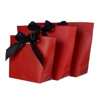 Liefern Sie Produktion Geschenk Kleidung Tasche Einkaufstasche Geschenk Kosmetik Kraftpapier Tasche Individuelles Logo main image 4