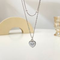 Retro Stacked Double-layer Pearl Heart Pendant Alloy Clavicle Chain main image 3
