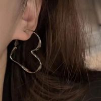 Fashion Exaggerated Big Heart Hollow Alloy Hoop Earrings main image 3
