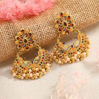 Retro Fashion Dripping Oil Peacock Feather Pearl Tassel Earrings main image 3