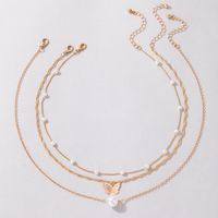 Simple Pearl Butterfly Three-layer Geometric Beaded Multi-layer Alloy Clavicle Chain main image 4