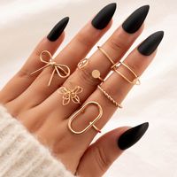 Fashion Flower Bow Ring Set Geometric Hollow Spiral Open Ring Eight Pieces sku image 1