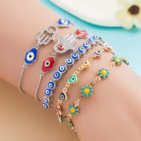 Fashion Creative Devil's Eye Micro-set Diamond Heart Floral Copper Bracelet main image 1