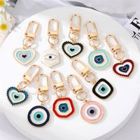 Simple Colorful Eyes Heart Keychain Alloy Irregular Round Bag Pendant Accessories main image 1