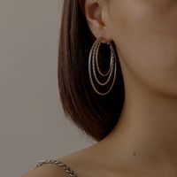 New Simple Three-ring Metal Twist Hollow Hoop Earrings main image 2