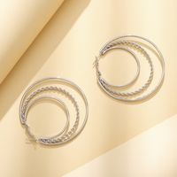 New Simple Three-ring Metal Twist Hollow Hoop Earrings main image 3