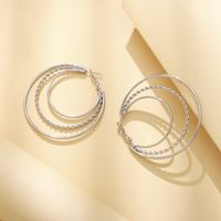New Simple Three-ring Metal Twist Hollow Hoop Earrings main image 4