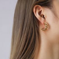 Fashion Twist Hollow C- Shaped Female Titanium Steel Plated 18k Real Gold Stud Earrings main image 3