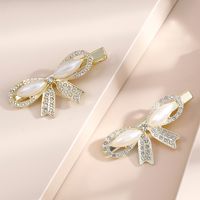 2-piece Pearl Barrettes Korean Rhinestone Edge Clip Graceful Bow Summer Headdress main image 1