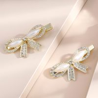 Barrettes De Perlas De 2 Piezas Corea Diamante De Imitación Borde Clip Elegante Arco Tocado De Verano main image 1