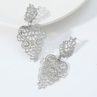 Fashion Wholesale Hollow Heart Shaped Pendant Carved Alloy Earrings main image 4