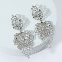 Fashion Wholesale Hollow Heart Shaped Pendant Carved Alloy Earrings main image 2