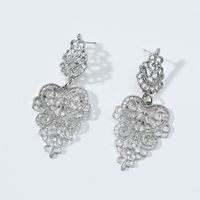 Fashion Wholesale Hollow Heart Shaped Pendant Carved Alloy Earrings main image 3