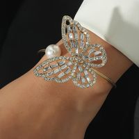 Simple Hollow Butterfly Shape Inlaid Rhinestone Pearl Opening Bracelet main image 1