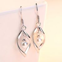 New Simple Style Wavy Pearl Pendant Alloy Earrings main image 1