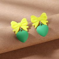 Europe And America Creative Wild Frosted Bow Peach Heart Earrings main image 1