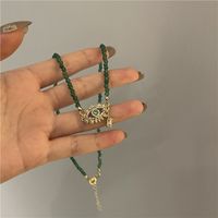 Fashion Bohemian Evil Eye Turquoise Handmade Beaded Pearl Cross Glass Stone Necklace main image 1
