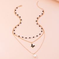 Fashion Ornament Beautiful Beaded Pearl Alloy Clavicle Chain Bow Pendant main image 1