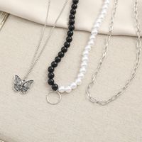 Creative Retro Multi-layer Chain Black And White Beads Butterfly Pendant Necklace main image 2
