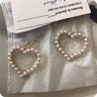Ins Style Cute Exaggerated Star Heart Alloy Stoving Varnish Plating Inlaid Pearls No Inlaid Women's Earrings main image 3