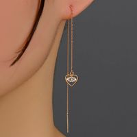 Fashion Micro Inlaid Zircon Heart  Devil's Eye Pendant Tassel Piercing Copper Earrings Pairs sku image 1