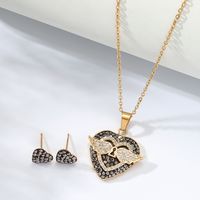New Fashion Simple 18k Gold Plated Heart Lock Wings Copper Necklace Earrings Set sku image 1