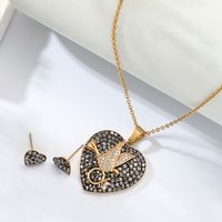 Fashion Simple Plated 18k Gold Heart-shaped Flying Pigeon Copper Necklace Earrings Set main image 4