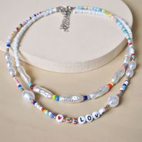 European And American Combinations Stacked Cross-border Jewelry Letters Love Special-shaped Pearl Necklace Female Creative Color Rice Bead Clavicle Chain main image 4