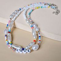 European And American Combinations Stacked Cross-border Jewelry Letters Love Special-shaped Pearl Necklace Female Creative Color Rice Bead Clavicle Chain main image 5