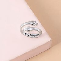 Fashion Geometric Hands Hug Lettering Alloy Ring main image 8