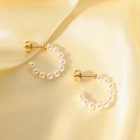 Fashion Simple Pearl C-shaped Titanium Steel Hoop Earrings main image 1