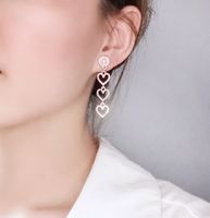 Jolies Boucles D'oreilles Longues Avec Perle En Forme De Cœur Creux main image 3