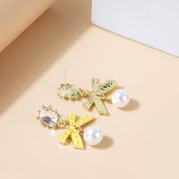 Boucles D'oreilles Simples En Diamant Avec Perle Et Nœud À Long Pampille main image 4