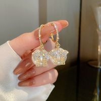 Fashion Bow Pearl Ear Buckle Diamond Alloy Ear Jewelry main image 1