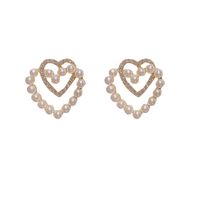 Pendientes De Tuerca De Aleación En Forma De Corazón Hueco De Perla De Diamante Retro De Moda main image 6