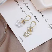 Cute Hollow Bear Asymmetrical Diamond Pearl Earrings main image 4
