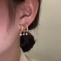 Boucles D&#39;oreilles Femme Cool Beau Design De Niche Simple Japonais Et Coréen Un Trou D&#39;oreille 3 Cercles Pompon En Zircon Argent 925 Boucles D&#39;oreilles Rouges Filet Aiguille main image 5