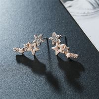 Pendientes De Metal De Diamante Geométrico Con Clip De Oreja De Estrella De Circón De Moda Simple Al Por Mayor sku image 3