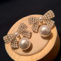 Fashion Simple Pearl Bow Earrings Alloy Drop Earrings main image 5