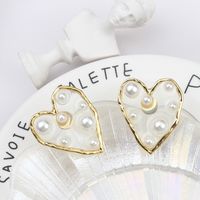 New Street Night Market Silver Needle Korean Version Pearl Love Earrings Sweet Temperament Peach Heart Pearl Stud Earrings main image 5