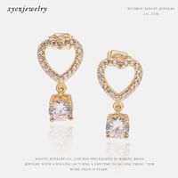 Fashion Gold-plated Four-claw Zircon Hollow Heart Earrings sku image 1