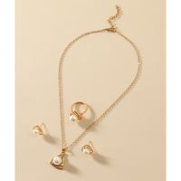 Fashion Hollow-out Triangle Pearl Alloy Ear Stud Necklace Ring Set main image 2